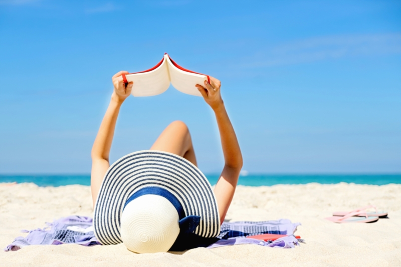 Woman reading on the beach