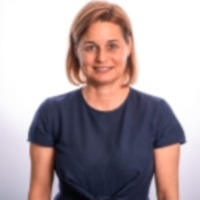 Mme Annick Debra
